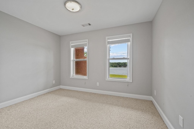 unfurnished room with carpet