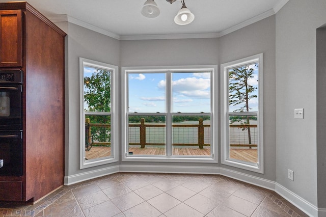 unfurnished dining area with crown molding