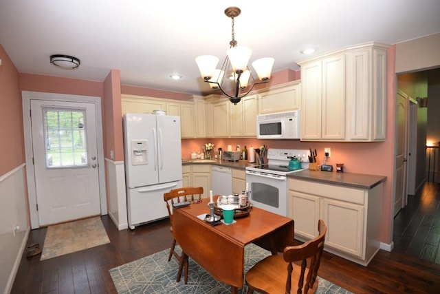 kitchen with a chandelier, dark wood-type flooring, white appliances, and decorative light fixtures