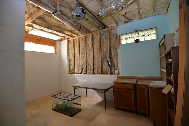 below grade area with concrete block wall