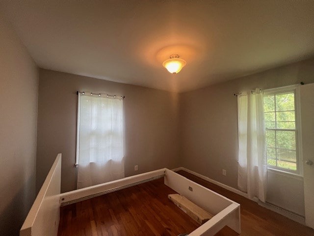 spare room featuring hardwood / wood-style floors