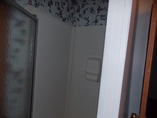 interior space with an enclosed shower