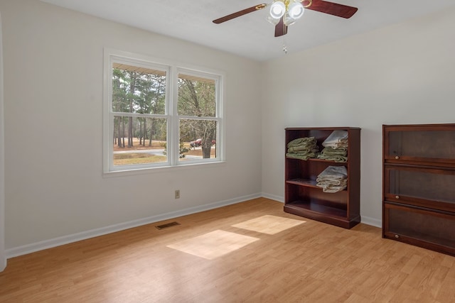 interior space featuring light wood-type flooring and ceiling fan