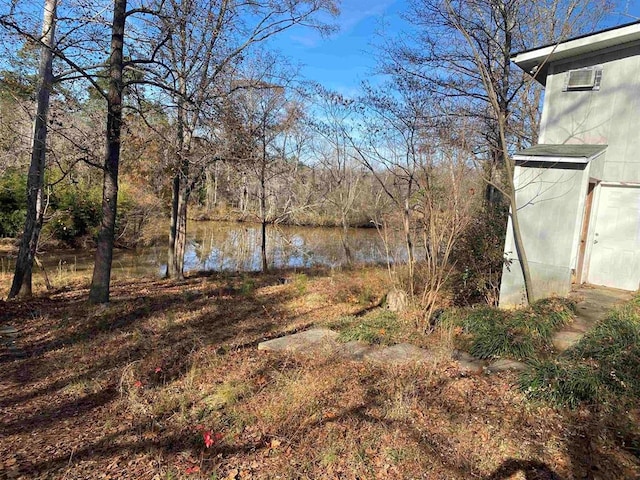 view of yard with a water view