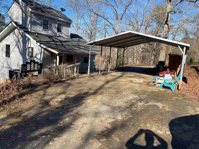 view of property exterior with a carport