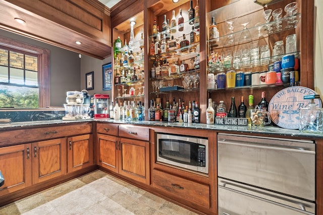 bar featuring stainless steel microwave