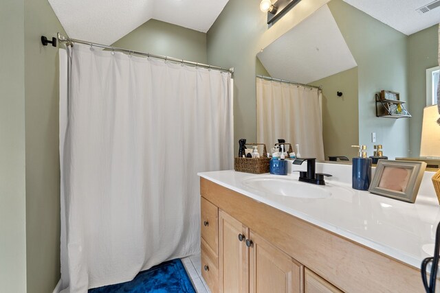 793 Greene Settlement Rd, Gray, GA 31032 - full bath with vanity, lofted ceiling, and a shower with shower curtain