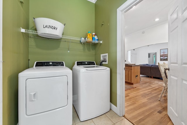 793 Greene Settlement Rd, Gray, GA 31032 - washroom with washer and clothes dryer and light tile patterned floors