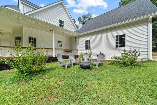 793 Greene Settlement Rd, Gray, GA 31032 - view of grassy yard with an outdoor fire pit and a wooden deck