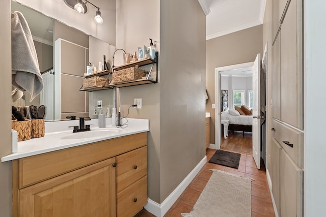 793 Greene Settlement Rd, Gray, GA 31032 - ensuite bathroom featuring crown molding, vanity, and tile patterned flooring