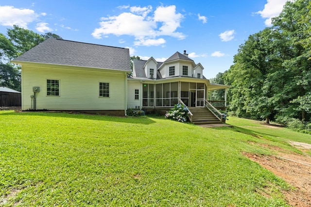 793 Greene Settlement Rd, Gray, GA 31032 - rear view of house with a sunroom and a lawn