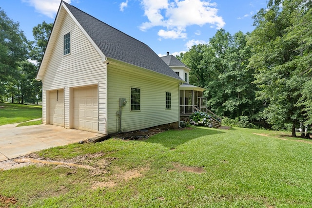 793 Greene Settlement Rd, Gray, GA 31032 - view of side of home featuring a sunroom, a shingled roof, and a lawn