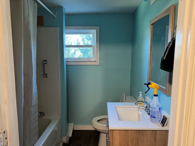 full bathroom featuring hardwood / wood-style flooring, toilet, vanity, and shower / bathtub combination with curtain