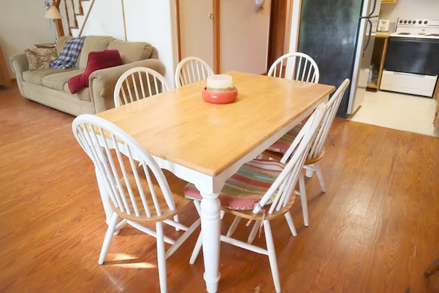 dining room featuring light wood-type flooring