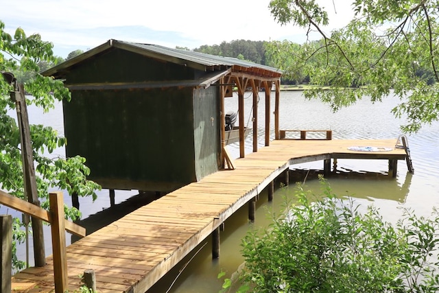 dock area featuring a water view
