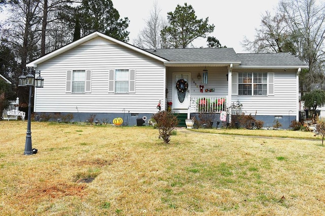 view of front of property featuring covered porch and a front lawn