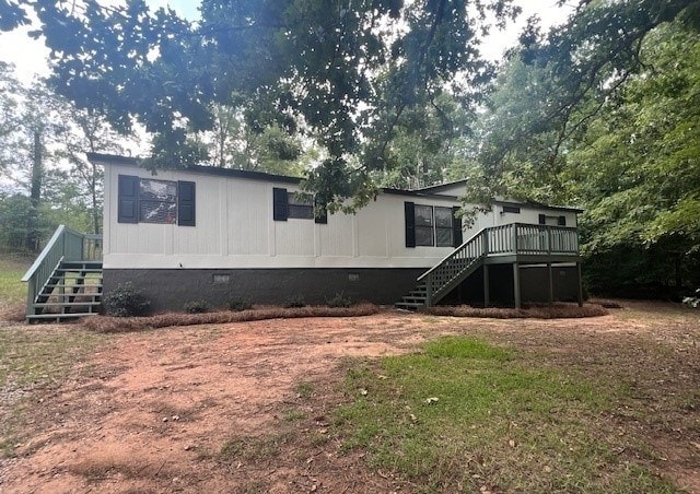 rear view of house with a deck