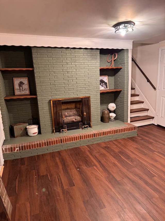 interior details with a fireplace and wood-type flooring