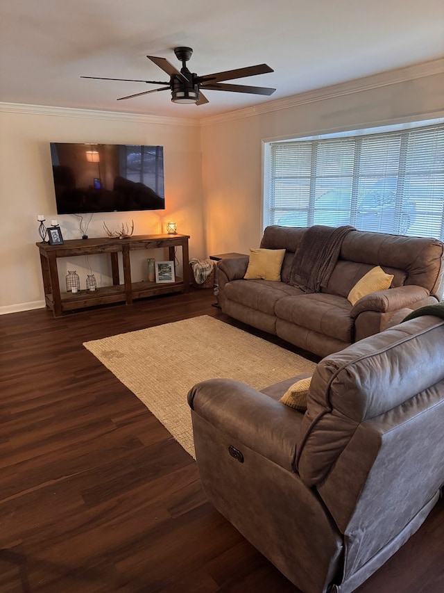 living room with ceiling fan, dark hardwood / wood-style floors, and crown molding