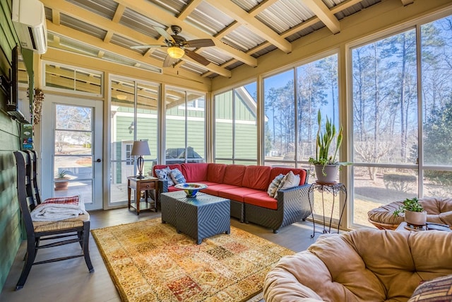 sunroom with an AC wall unit, plenty of natural light, coffered ceiling, and beam ceiling