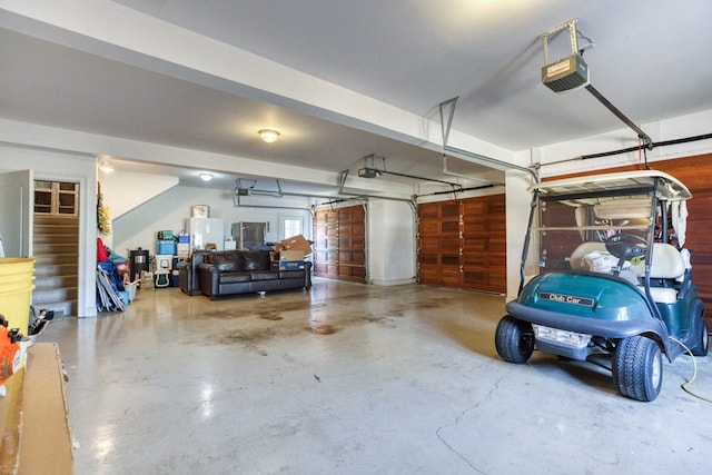 garage featuring a garage door opener