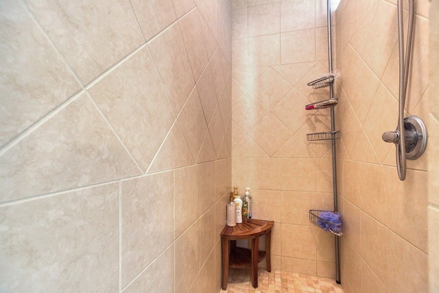 room details with a tile shower