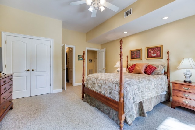 bedroom with visible vents, recessed lighting, ceiling fan, a closet, and light colored carpet