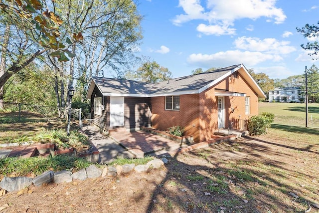 back of property with a patio area