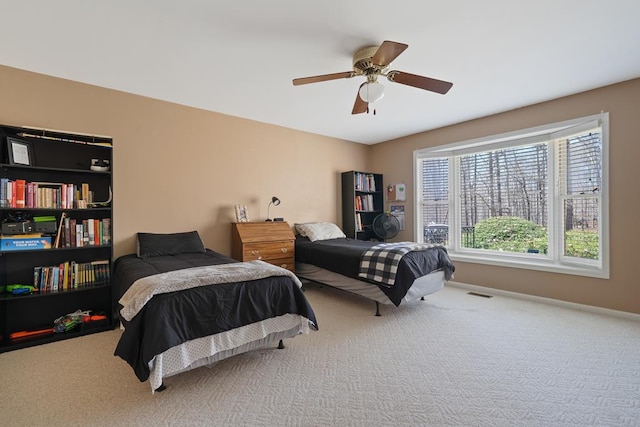 220 Oconnor Dr, Milledgeville, GA 31061 - bedroom with carpet floors, ceiling fan, and baseboards
