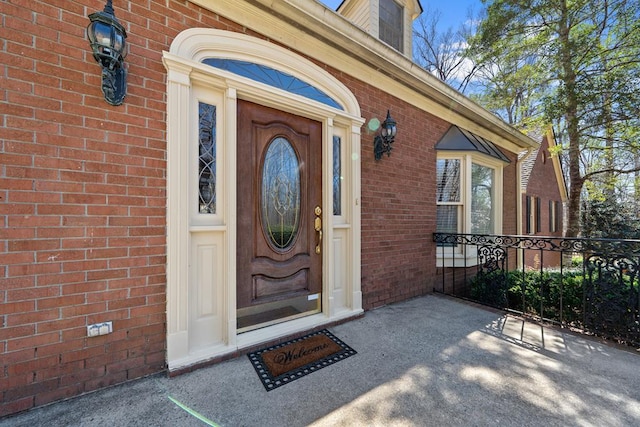 220 Oconnor Dr, Milledgeville, GA 31061 - doorway to property featuring brick siding and a porch