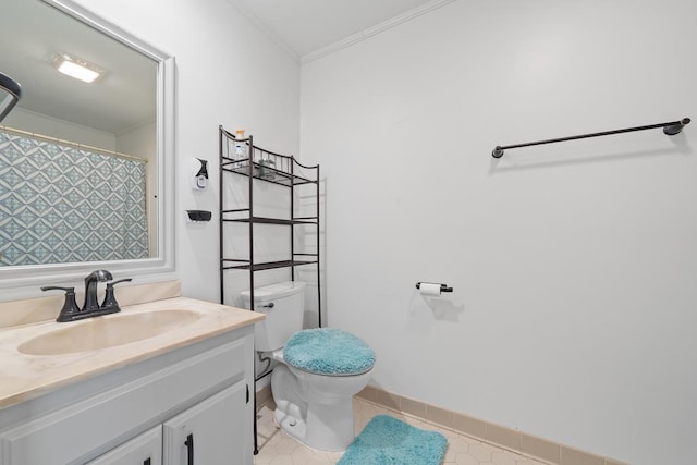 220 Oconnor Dr, Milledgeville, GA 31061 - bathroom featuring toilet, crown molding, vanity, and tile patterned floors