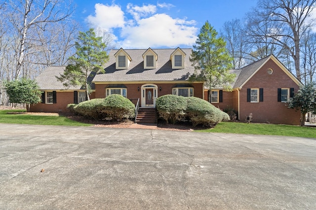 220 Oconnor Dr, Milledgeville, GA 31061 - cape cod home with brick siding and a front yard