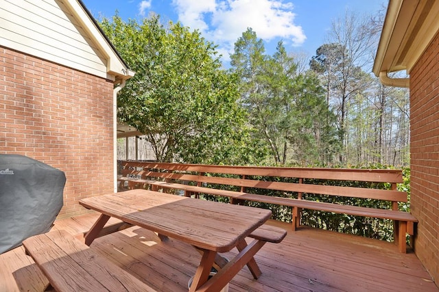 220 Oconnor Dr, Milledgeville, GA 31061 - wooden terrace featuring outdoor dining area and a grill