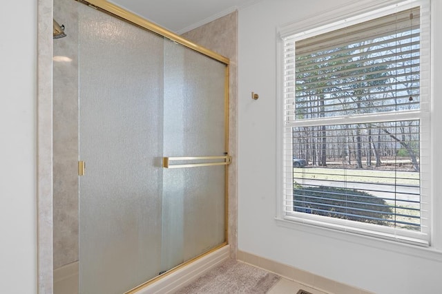 220 Oconnor Dr, Milledgeville, GA 31061 - bathroom with an enclosed shower, baseboards, and ornamental molding