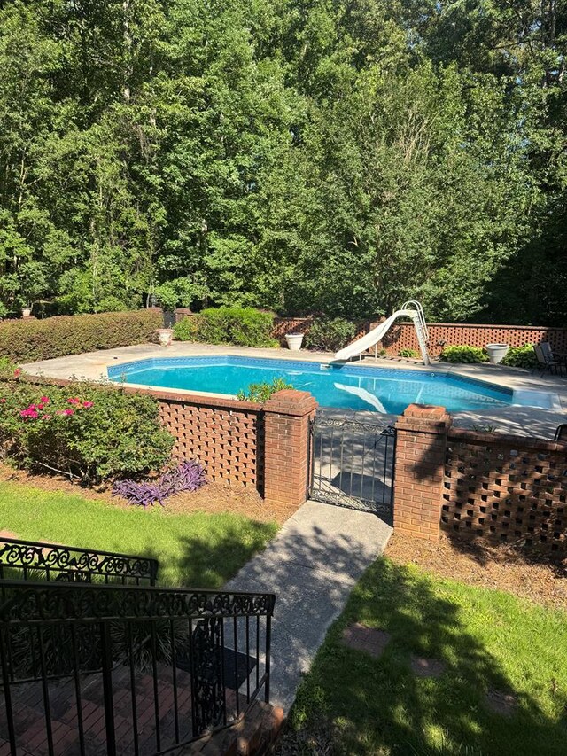 220 Oconnor Dr, Milledgeville, GA 31061 - view of pool featuring a water slide