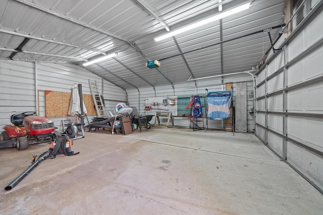 220 Oconnor Dr, Milledgeville, GA 31061 - garage with metal wall and a garage door opener