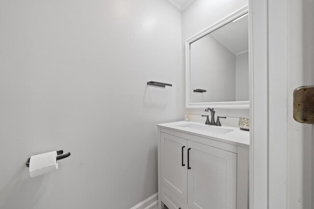 220 Oconnor Dr, Milledgeville, GA 31061 - bathroom with crown molding and vanity