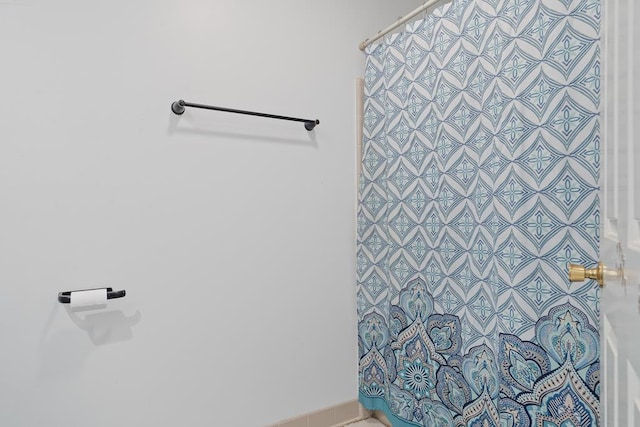 220 Oconnor Dr, Milledgeville, GA 31061 - bathroom featuring a shower with shower curtain