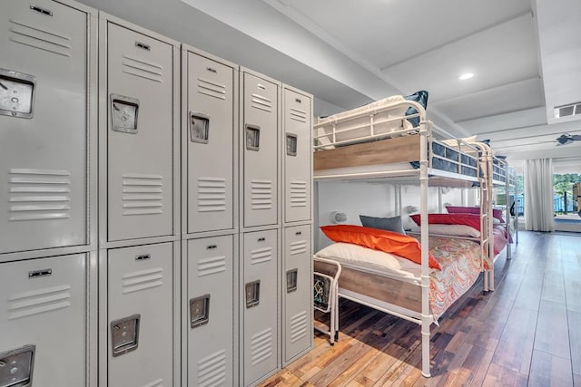 bedroom with recessed lighting, visible vents, and wood finished floors