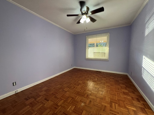 spare room with crown molding, ceiling fan, dark parquet floors, and a textured ceiling