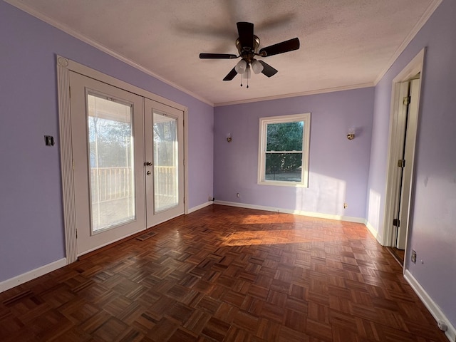 unfurnished room with french doors, dark parquet floors, crown molding, and a textured ceiling