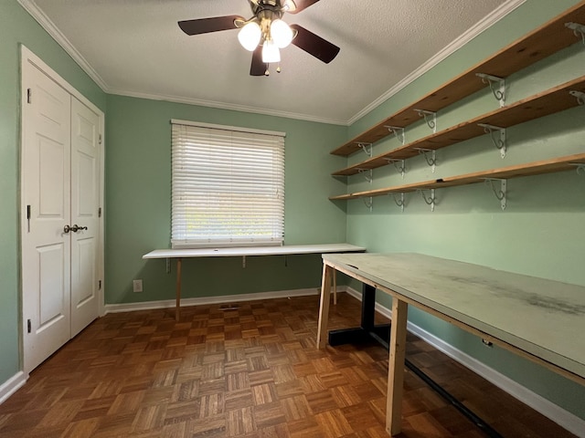 unfurnished office with ceiling fan, ornamental molding, dark parquet flooring, and a textured ceiling