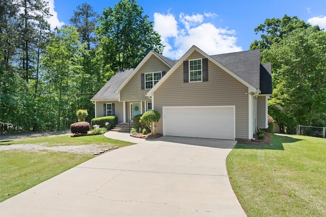 view of front of home featuring a garage and a front lawn