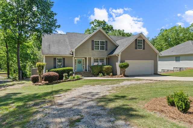 view of front facade with a garage and a front lawn