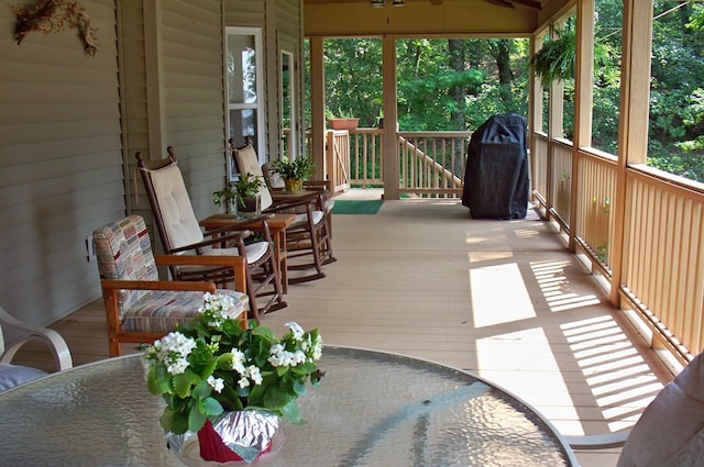 307 E River Bend Dr, Eatonton, GA 31024 - deck with a ceiling fan, outdoor dining area, and grilling area