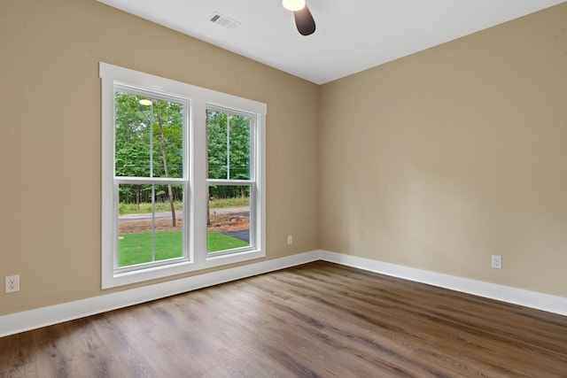 172 Southshore Rd, Eatonton, GA 31024 - spare room with ceiling fan and dark wood-type flooring