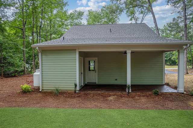 172 Southshore Rd, Eatonton, GA 31024 - rear view of house featuring roof with shingles