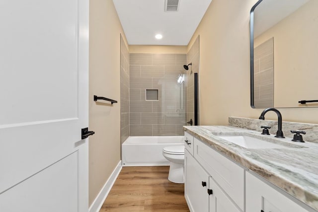 172 Southshore Rd, Eatonton, GA 31024 - bathroom with vanity, tub / shower combination, wood finished floors, and recessed lighting