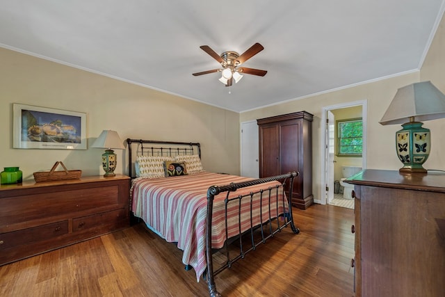 bedroom featuring wood finished floors, ornamental molding, and ceiling fan
