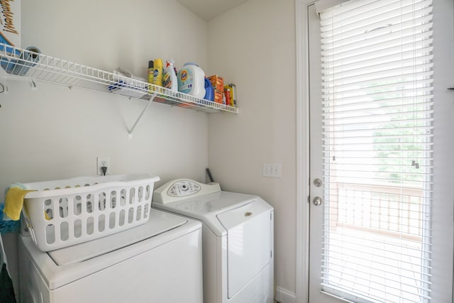 washroom with separate washer and dryer